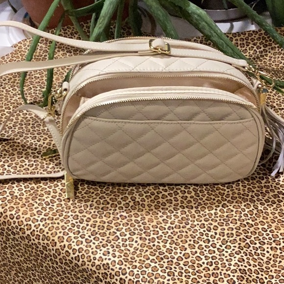 Like new Joy Imani bag trimmed in gold plated zipper attachments and shoulder. - Picture 7 of 13